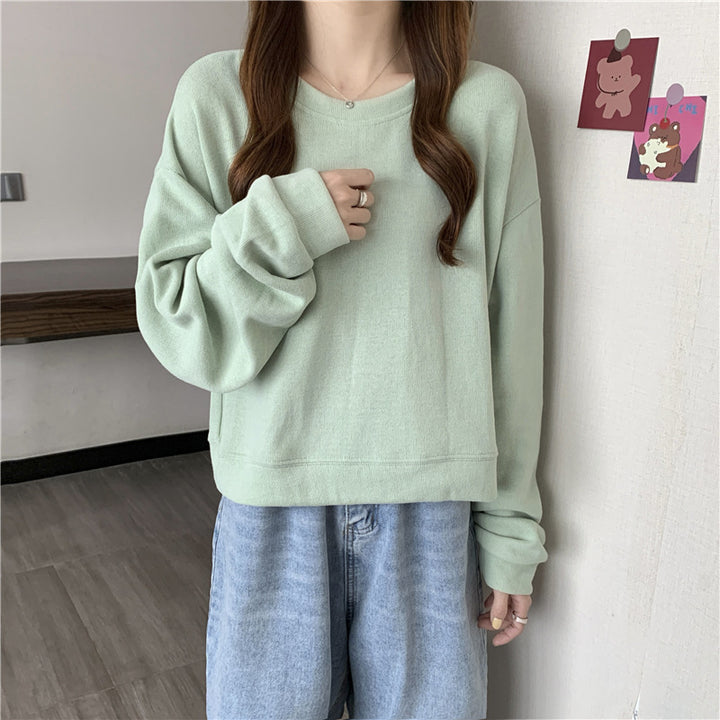 Kvinne casual cropped genser laget av myk bomullsblanding med stilren rund hals Skjora