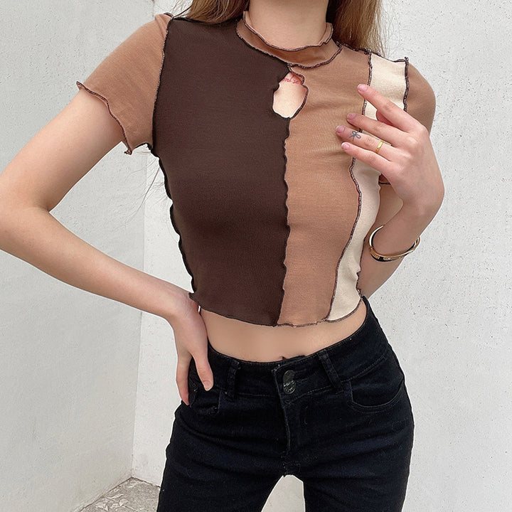 Dame cropped T-skjorte med unikt cut-out-design og kontrastsømmer Skjora