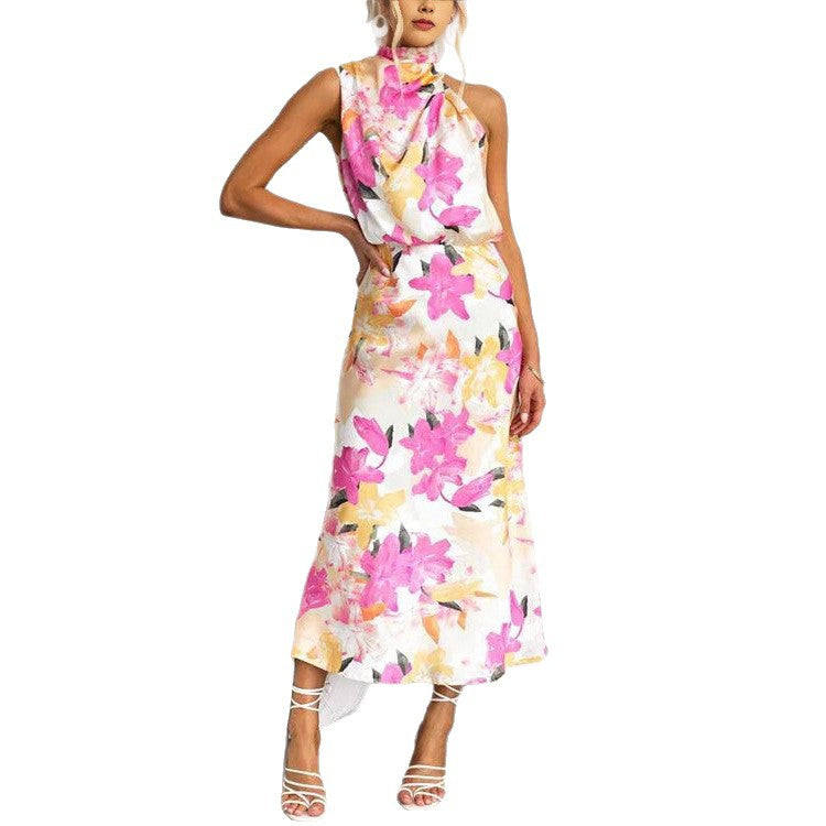 Kvinnens maxi kjole med asymmetrisk topp og blomsterprint Skjora