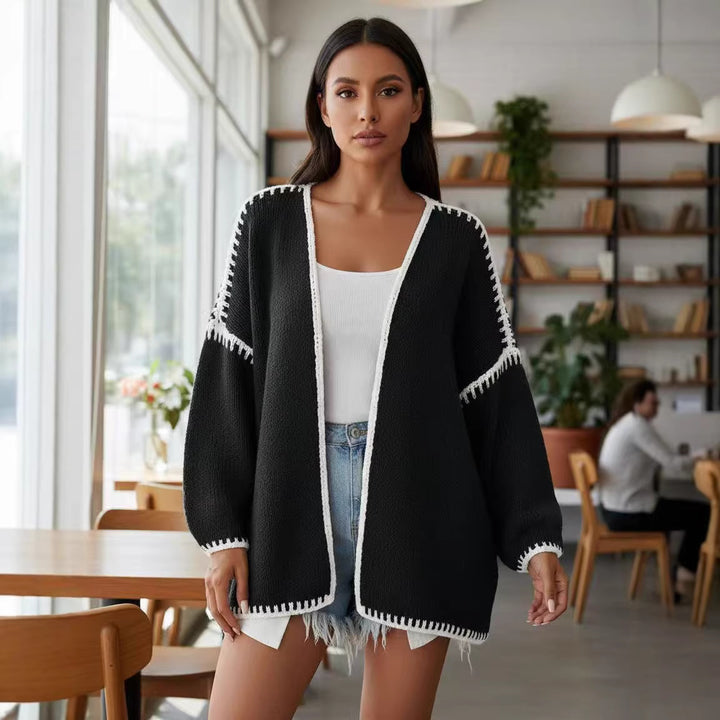 Kvinnenes åpne cardigan med elegante kontrastsømmer Skjora