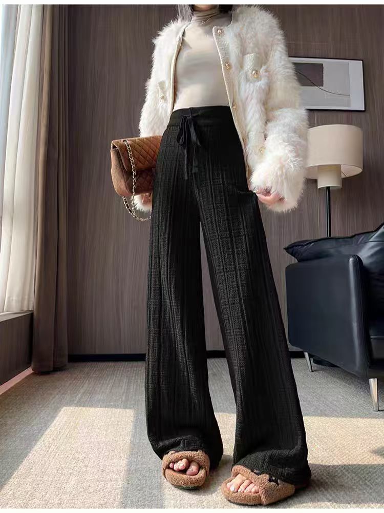 Women's loose summer trousers with elastic waist and fixed stripe pattern Skjora
