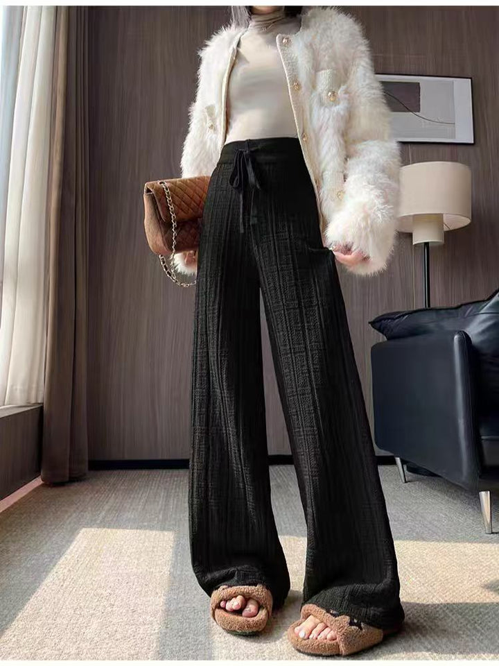 Women's loose summer trousers with elastic waist and fixed stripe pattern Skjora