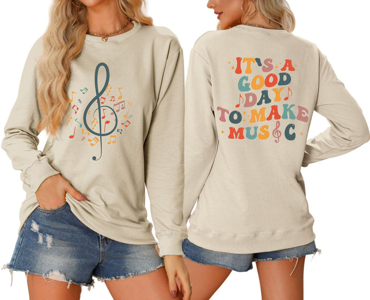 Dame sweatshirt med musikalsk motiv og kreativ skrift Skjora