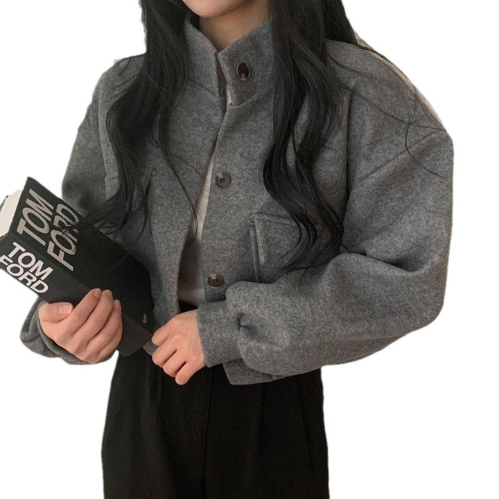 Damejakke laget av høykvalitets ullblanding med casual lommer og oversized snitt