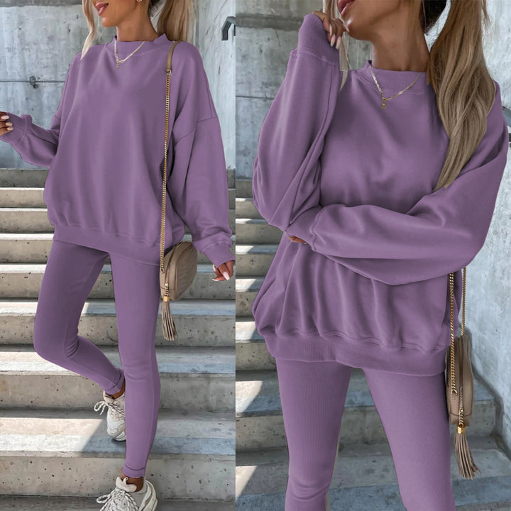Damesporty fritidssett med casual oversized genser og tettsittende tights Skjora