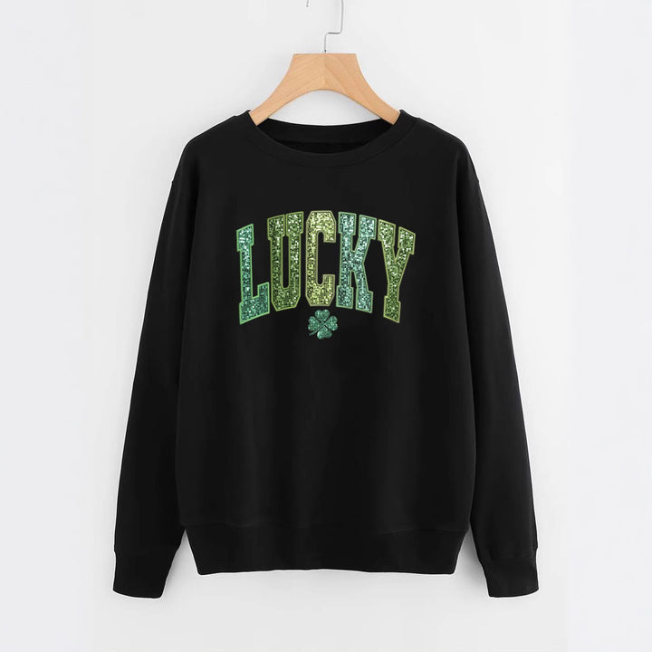 Dame uformell sweatshirt med glitrende skrift og firkløvermotiv Skjora