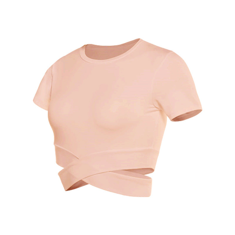Dame kortermet trenings-crop-top med innovativt draperingsutseende Skjora