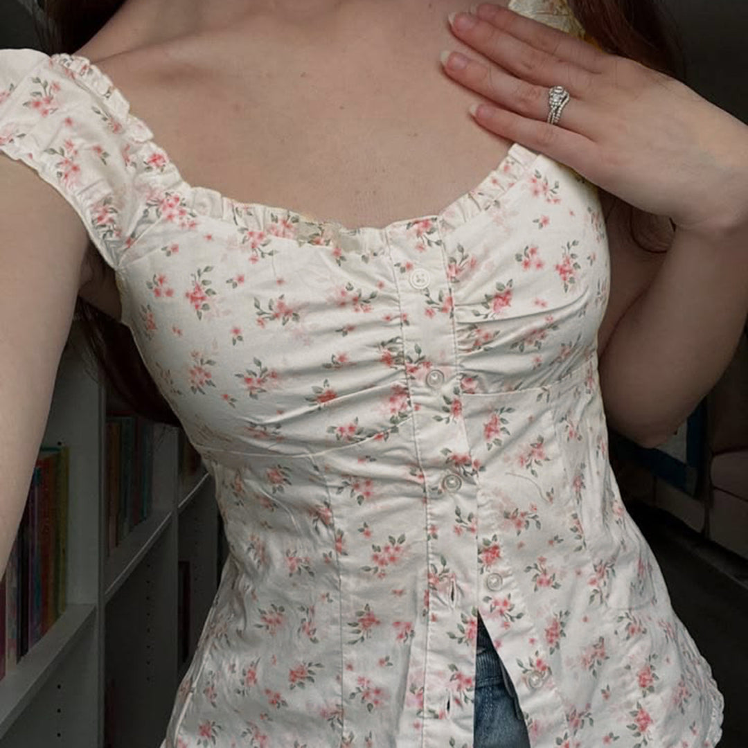 Damebluse med blomsterdesign og volangdetaljer Skjora