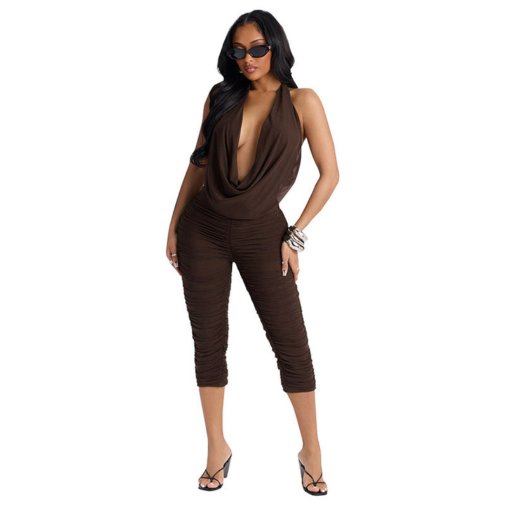 Damer elegant og figursydd jumpsuit med dyp V-hals og draperinger Skjora