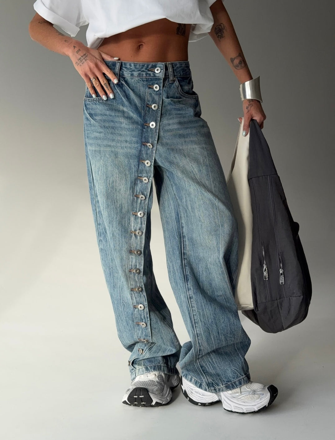 Kvinnevidde jeans med kontinuerlig knappestolpe Skjora