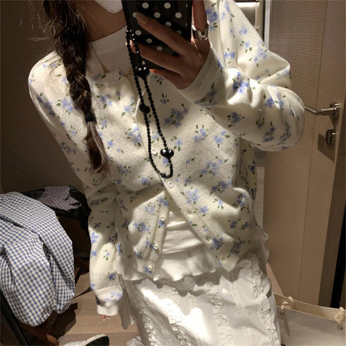 Dame cardigan med blomstermønster og knappeåpning Skjora