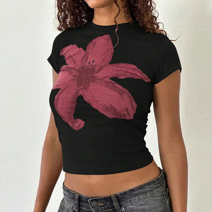 Dame Crop-T-skjorte med floralt design og kroppsnær passform Skjora