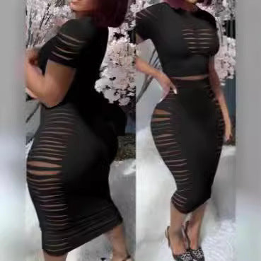 Damer Figurtilpasset kjole med transparente cut-out-detaljer Skjora