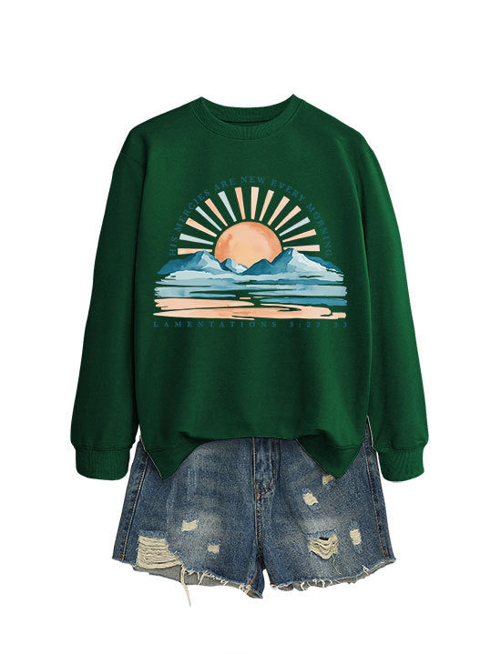 Kvinne sweatshirt med inspirerende soloppgang design og avslappet passform Skjora