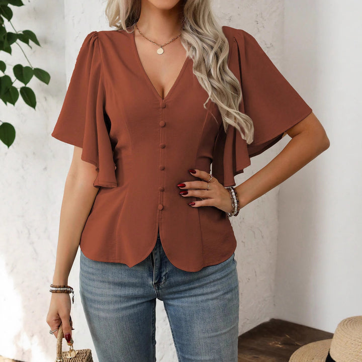 Dame elegant bluse med klokkeermer og knappdetalj Skjora