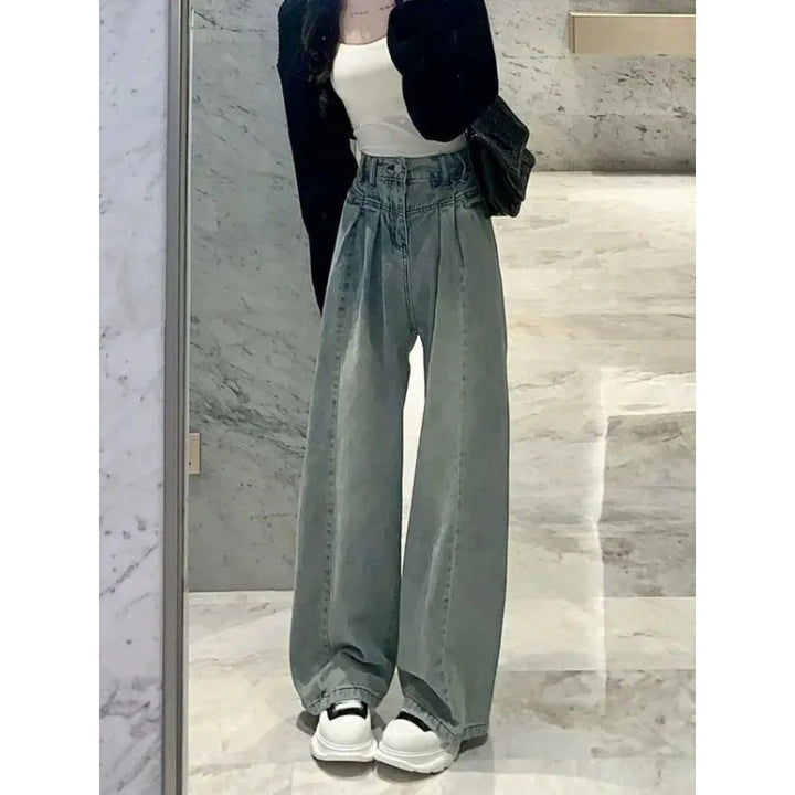 Kvinners vide høytekkede jeans med elegant midjebånddesign Skjora