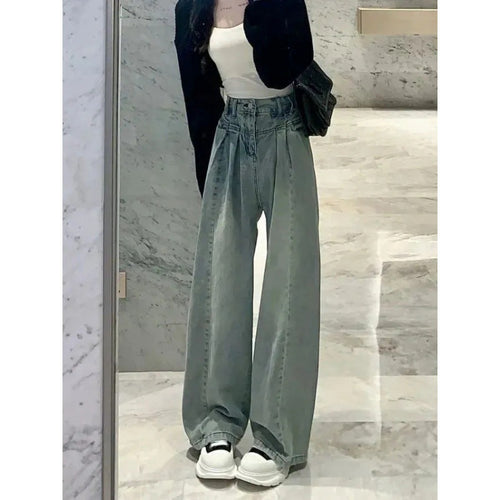 Kvinners vide høytekkede jeans med elegant midjebånddesign Skjora