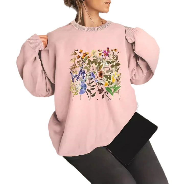 Dame sweatshirt med blomsterdesign og komfortabel passform Skjora