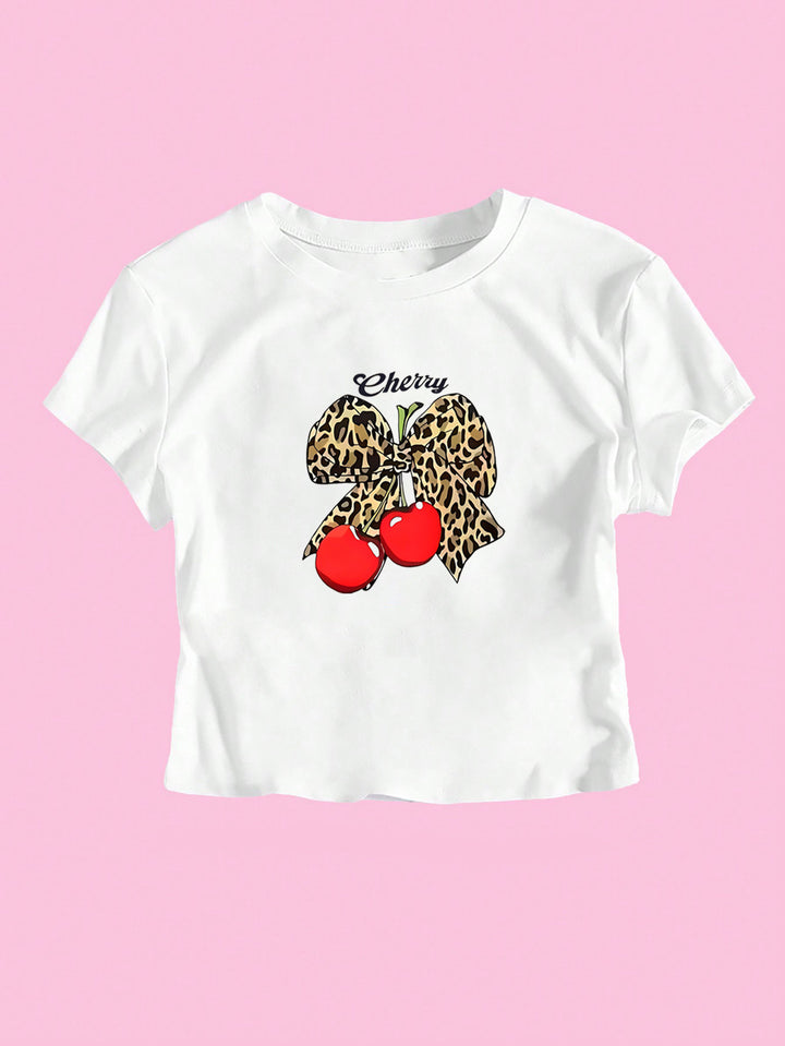 Dame Crop-T-skjorte med lekent leopard-sløyfemotiv og fruktig trykk Skjora
