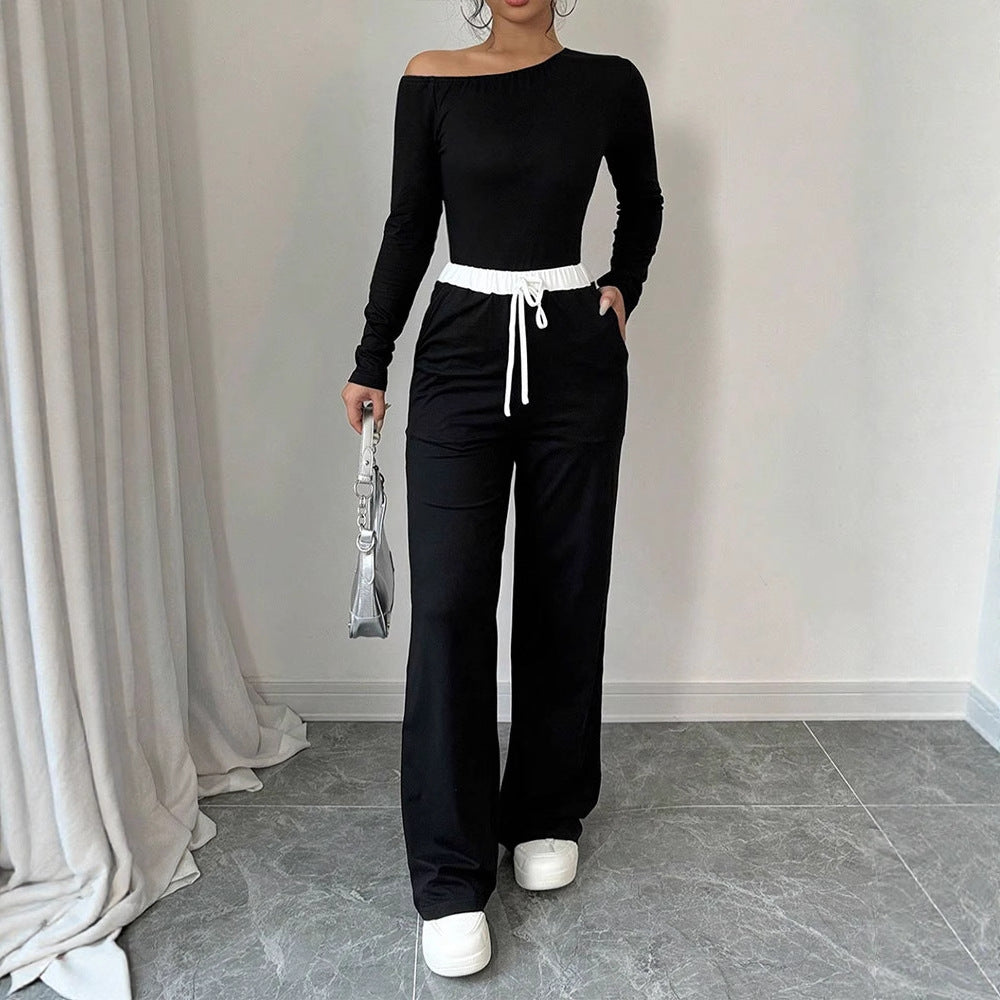 Damer Elegant jumpsuit med asymmetrisk topp og vide ben Skjora