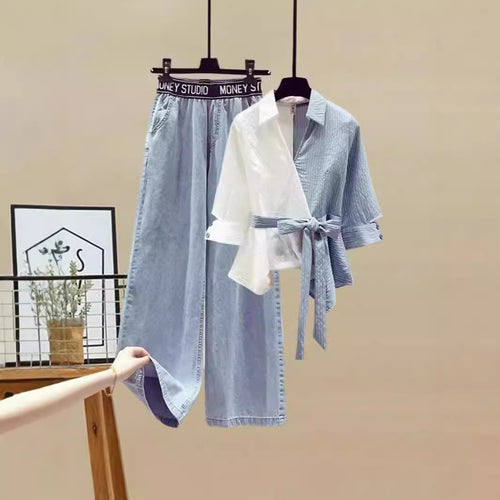 Dame To-delt Sett med løstsittende, stripete topp og vide jeans-bukser Skjora