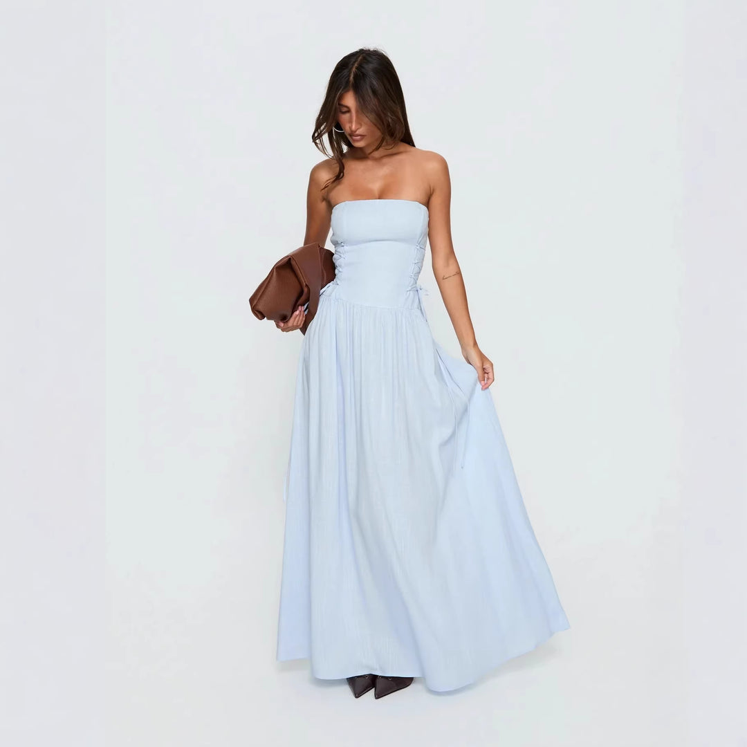 Damer maxi-kjole med off-shoulder design og sidesømsdetaljer med volanger Skjora