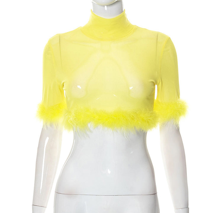 Dame trendy cropped topp med glamorøs fjærdetalj Skjora
