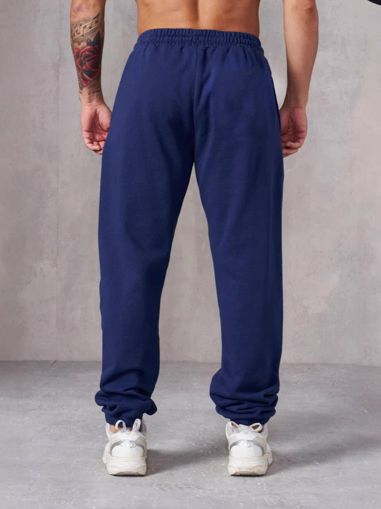 Herre Baggy Joggebukser med Elastisk Liv og Lommer på Siden Skjora