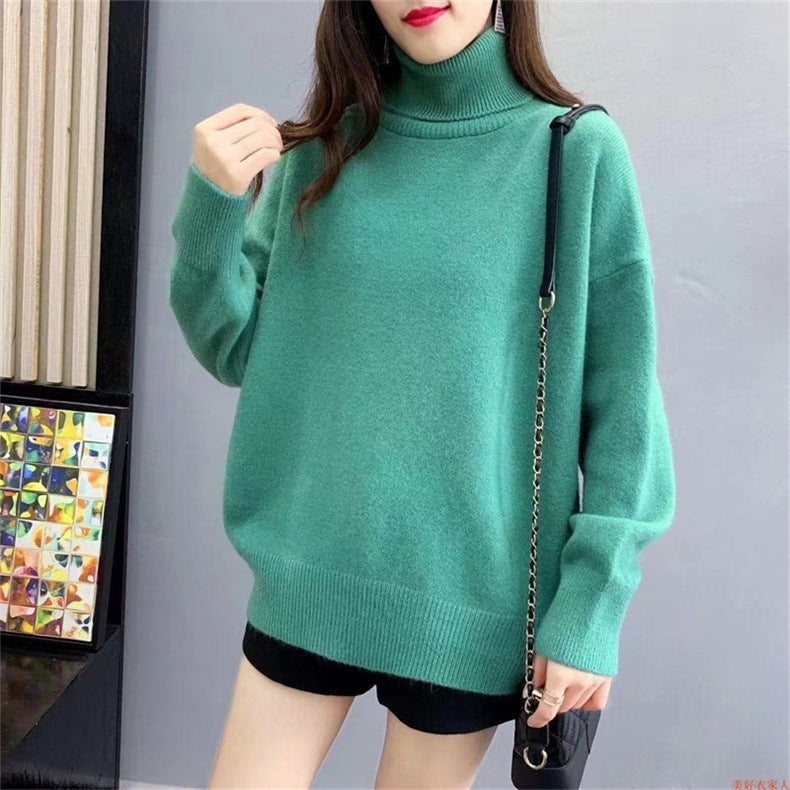 Kvinnens chunky strikkegenser med høy hals og oversized passform Skjora