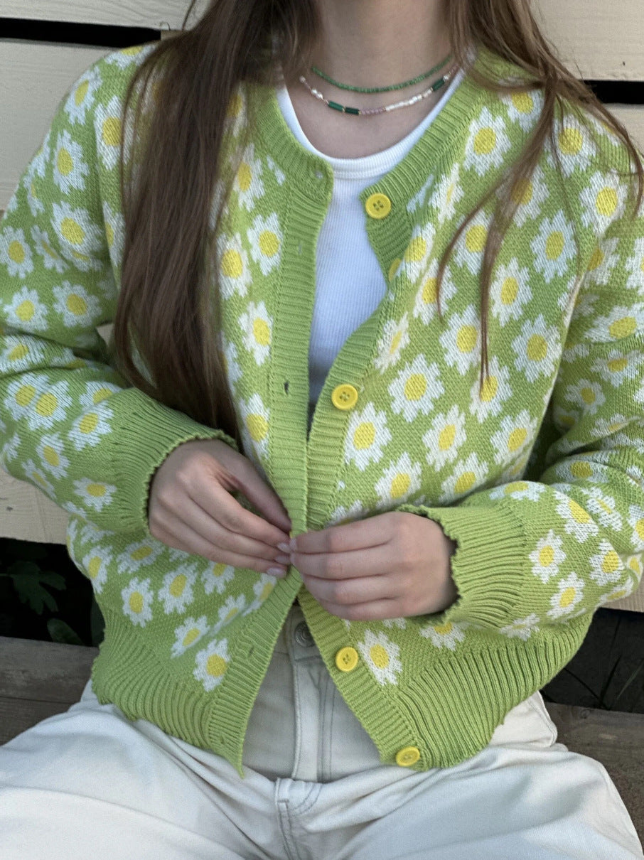 Dame cardigan med blomstermønster og fargerike knapper Skjora