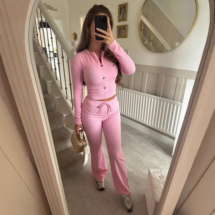 Kvinne jumpsuit med elegant knappelukking og avslappet snitt