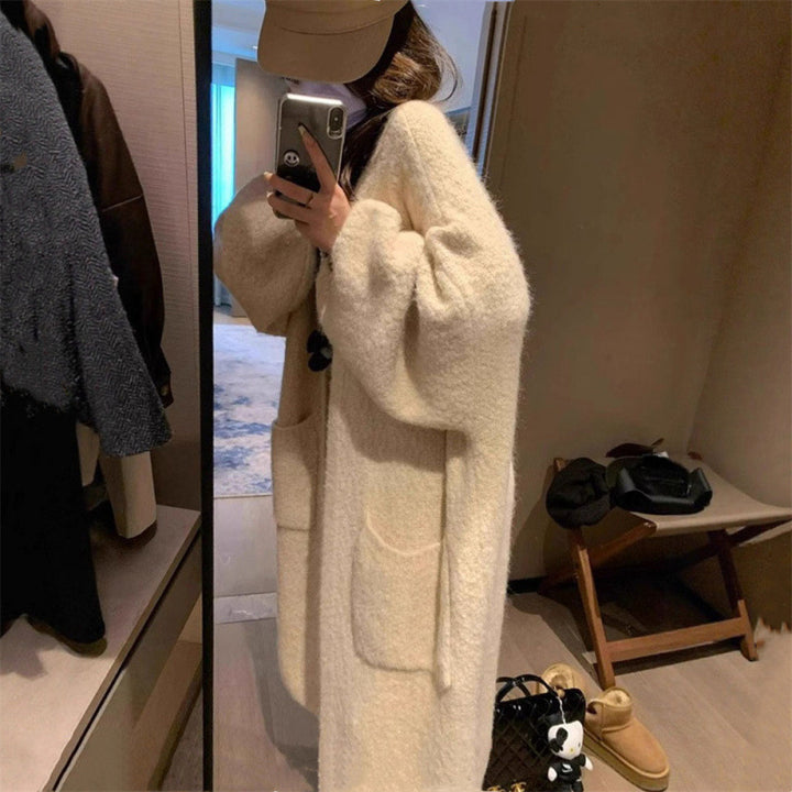 Kvinners fluffy cardigan med store lommer og løs passform Skjora