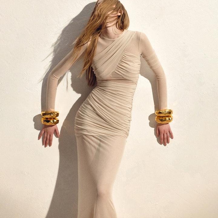 Elegant transparent maxi dress with refined drapes Skjora