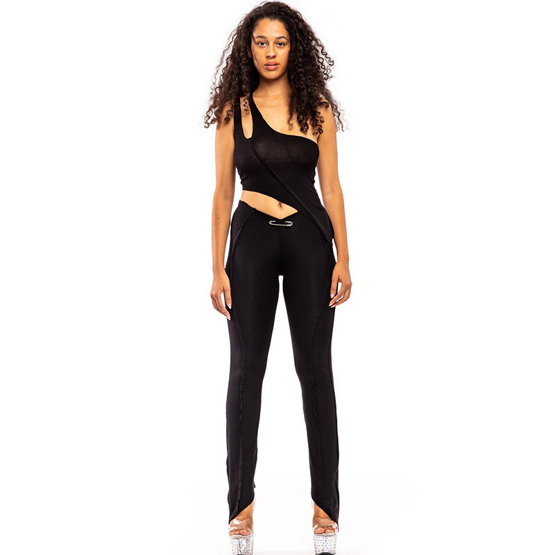 Dame asymmetrisk jumpsuit med moderne cut-out og elegant midjeform Skjora