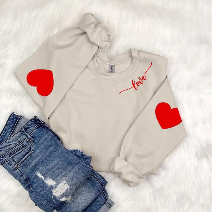 Dame sweatshirt med hjerte design og avslappet passform Skjora