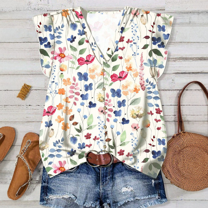 Damebluse med blomsterdesign Skjora