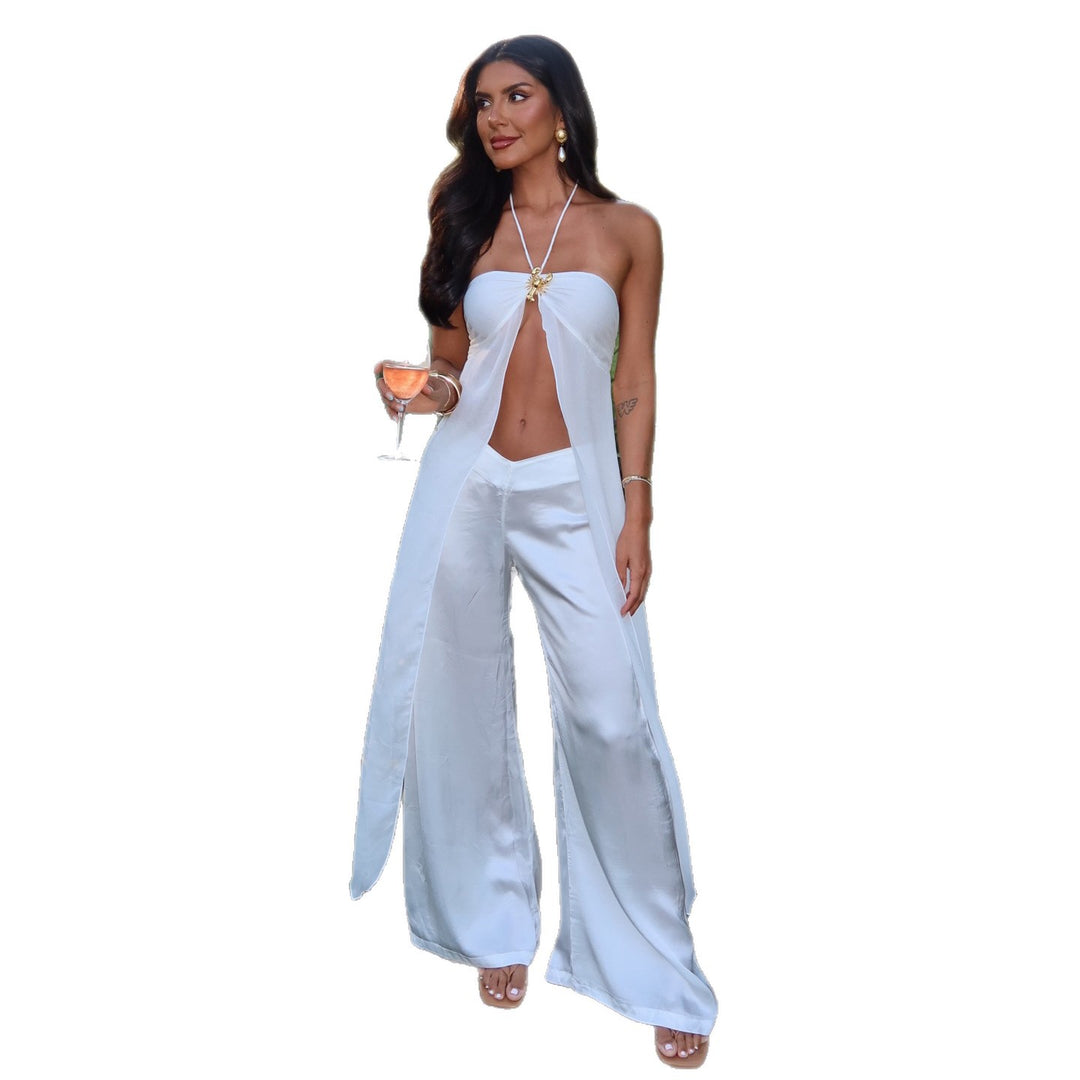Kvinnelig jumpsuit med elegant sideslits og tidløst design Skjora