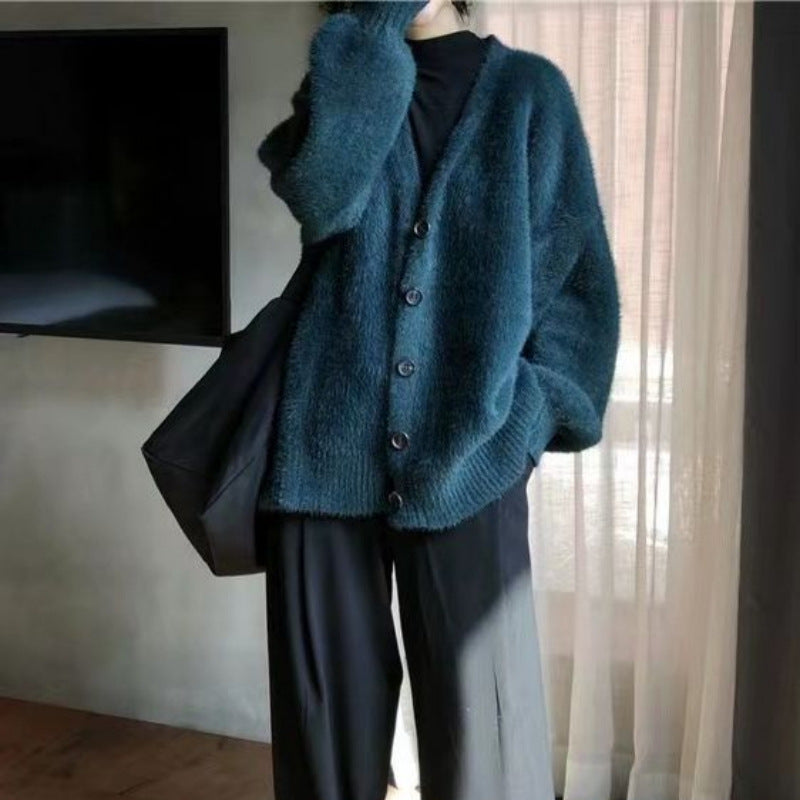 Kvinne koselig strikket cardigan med store knapper og en avslappet passform Skjora