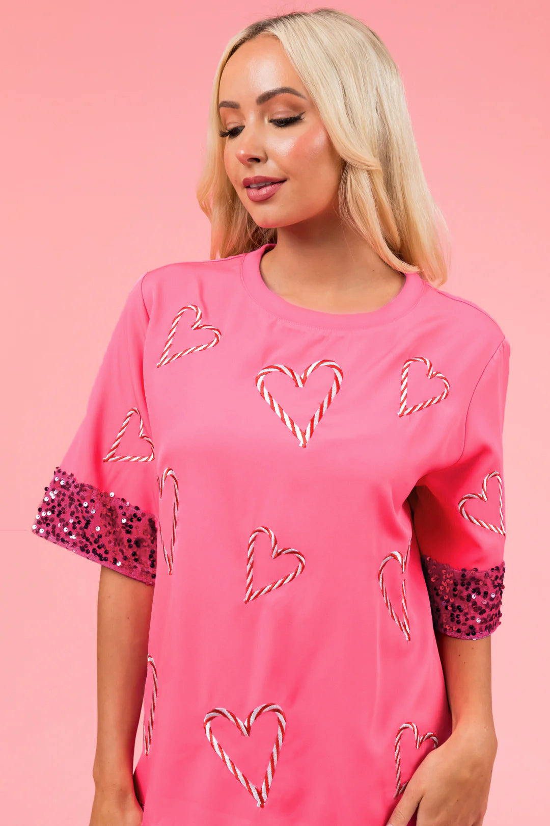 Dame Oversized T-skjorte med glitrende ermer og hjerte-mønster Skjora