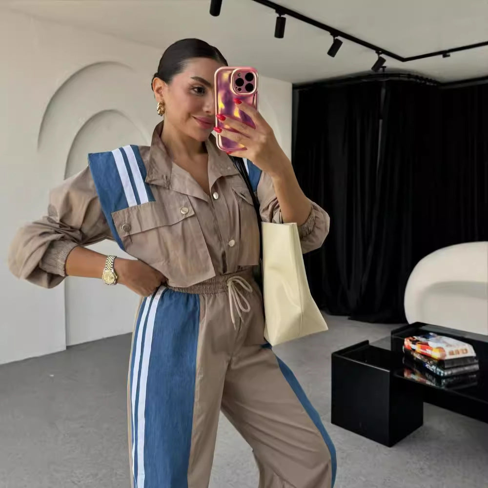 Women's sporty jumpsuit with sophisticated drawstring detail at the waist and contrasting stripes on the skirt