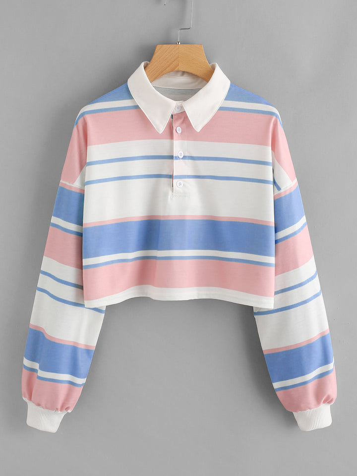 Dame polo skjorte i en avslappet crop design med et stilfullt fargeblokk mønster Skjora