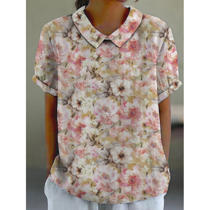 Dame kortermet bluse med florale accenter og klassisk krage Skjora