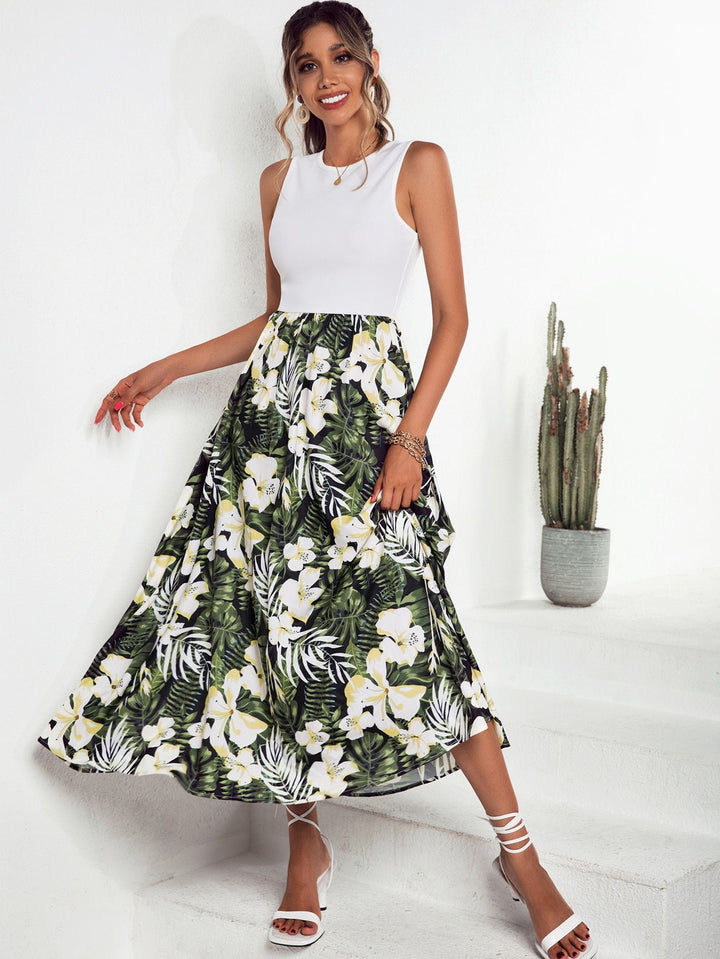 Kvinne maxi skjørt med blomsterdesign og flagrende hem Skjora
