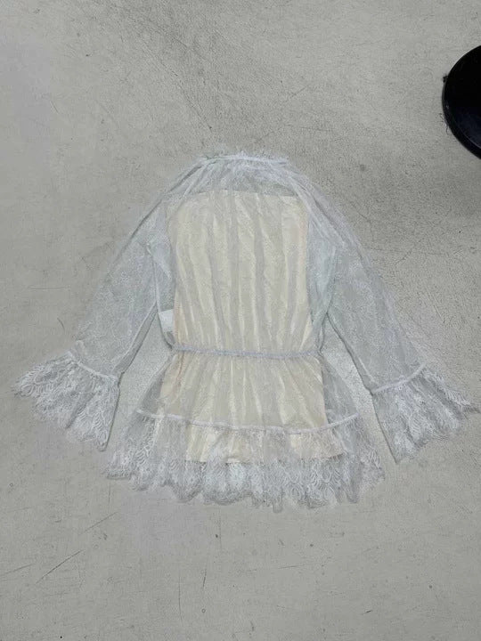 Dame spissbluse med detaljerte volanger og elegant snitt Skjora