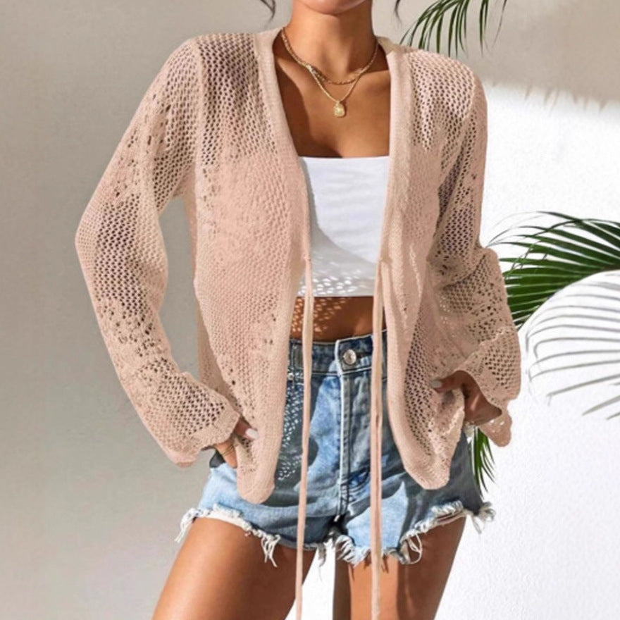 Dame cardigan med luftig heklestruktur og knytelukking Skjora