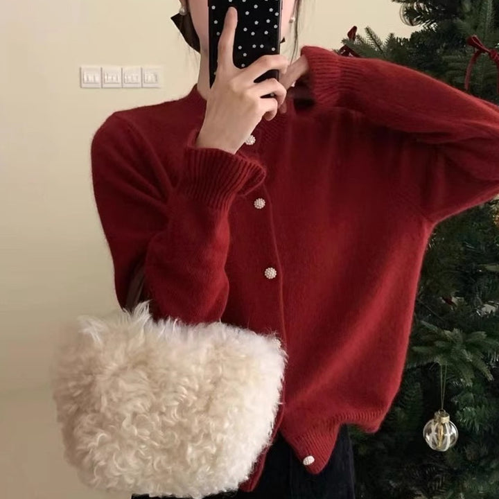 Dame koselig cardigan med elegant perleknappelukking Skjora