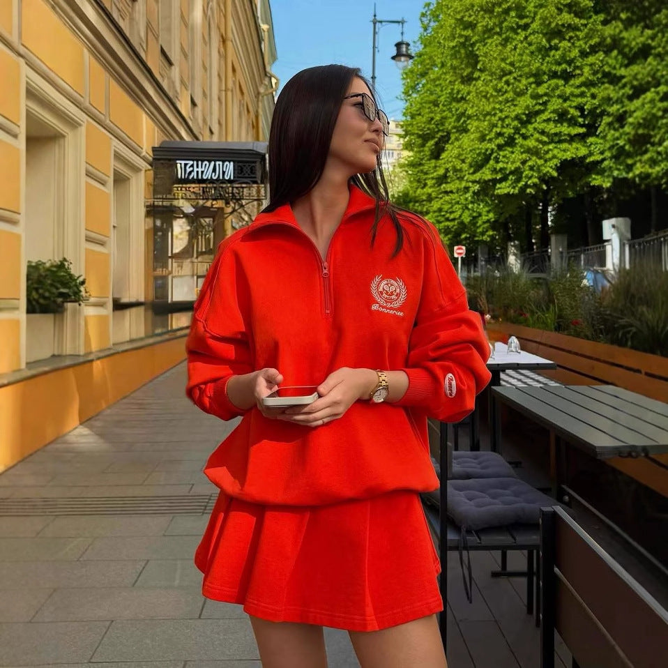 Dame sporty zip genser med avslappet snitt og broderi Skjora