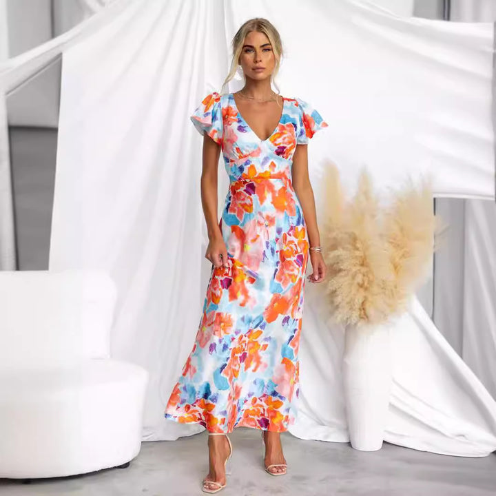 Kvinnes maxi kjole med blomsterdesign og flytende silhuett Skjora