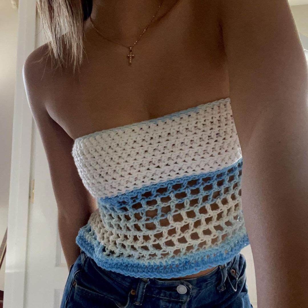 Women's crocheted top with side mesh design and elastic hem Skjora