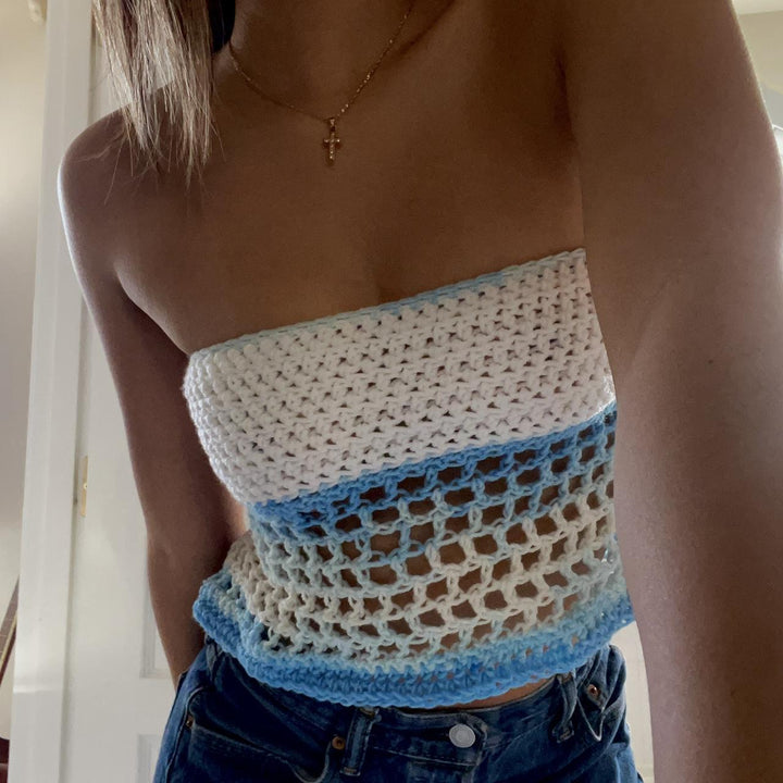 Women's crocheted top with side mesh design and elastic hem Skjora